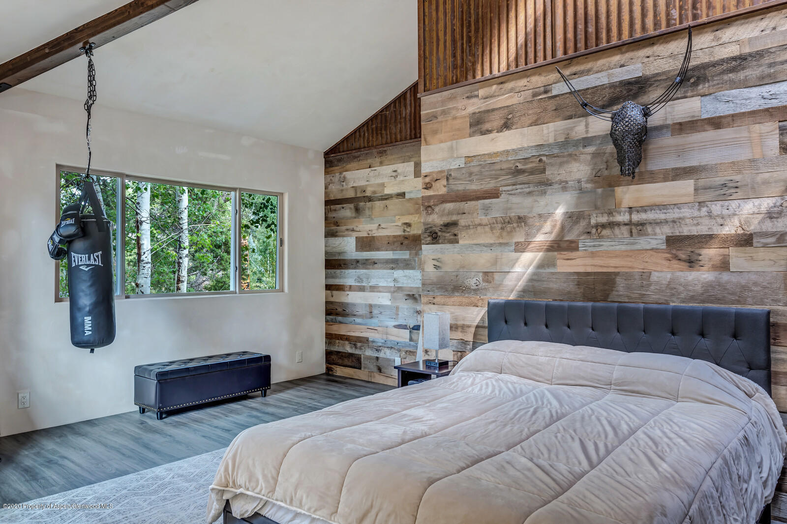 475 County Road 112 Carbondale, CO 81623 - Photo 37 of 53 a bedroom with a bed and a night stand