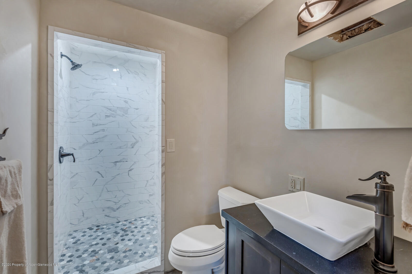 475 County Road 112 Carbondale, CO 81623 - Photo 38 of 53 a bathroom with a sink a toilet and shower