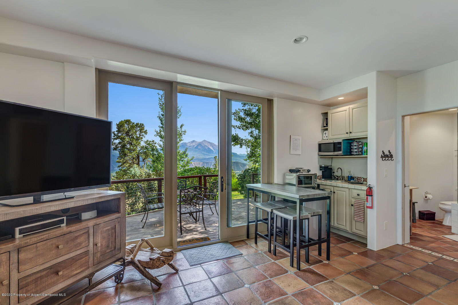 475 County Road 112 Carbondale, CO 81623 - Photo 43 of 53 a kitchen with stainless steel appliances a stove top oven a sink and a refrigerator