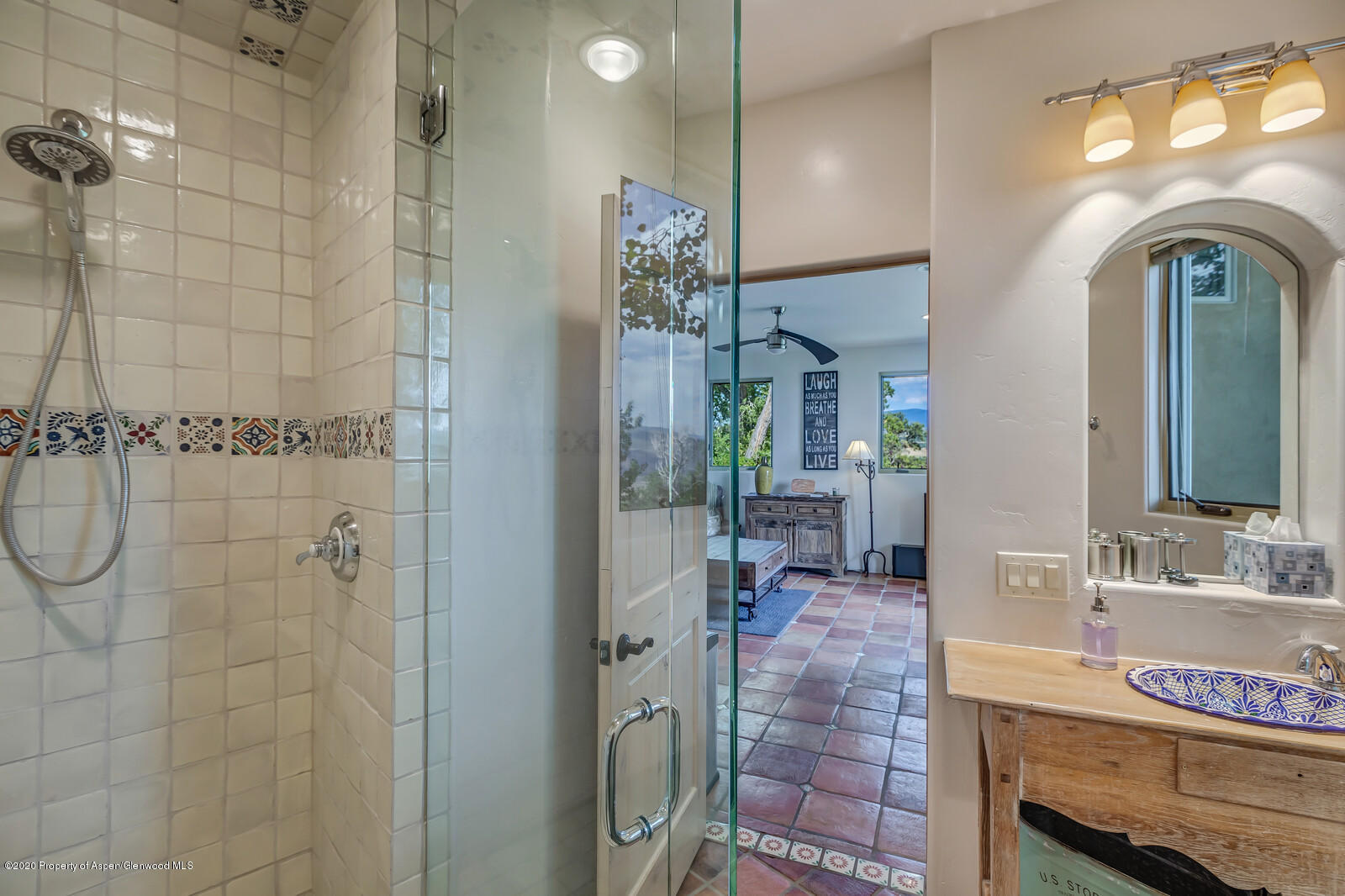 475 County Road 112 Carbondale, CO 81623 - Photo 46 of 53 a en suite bathroom with a granite countertop sink a mirror and shower