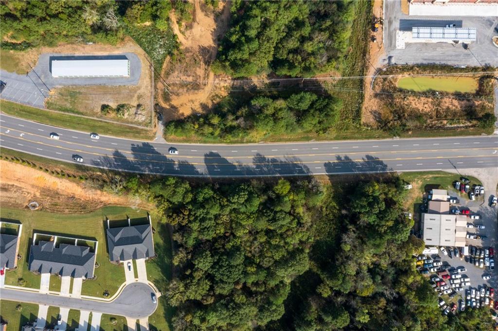 1401 Ga-53 Calhoun, GA 30701 - Photo 7 of 9 a view of a window of the house and a street