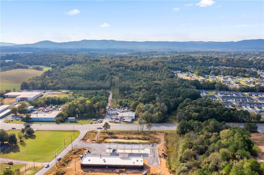 1401 Ga-53 Calhoun, GA 30701 - Photo 8 of 9 a view of a swimming pool with a mountain
