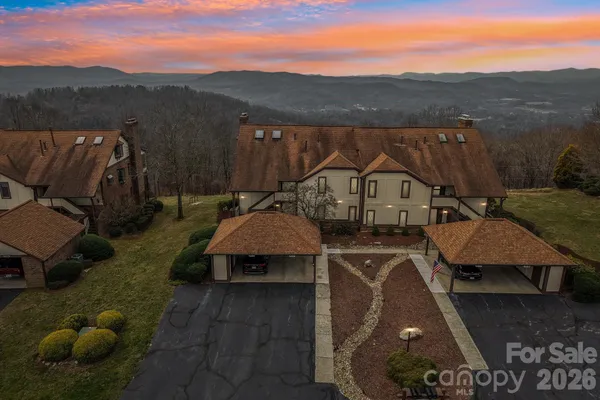 aerial view of a house with mountain view