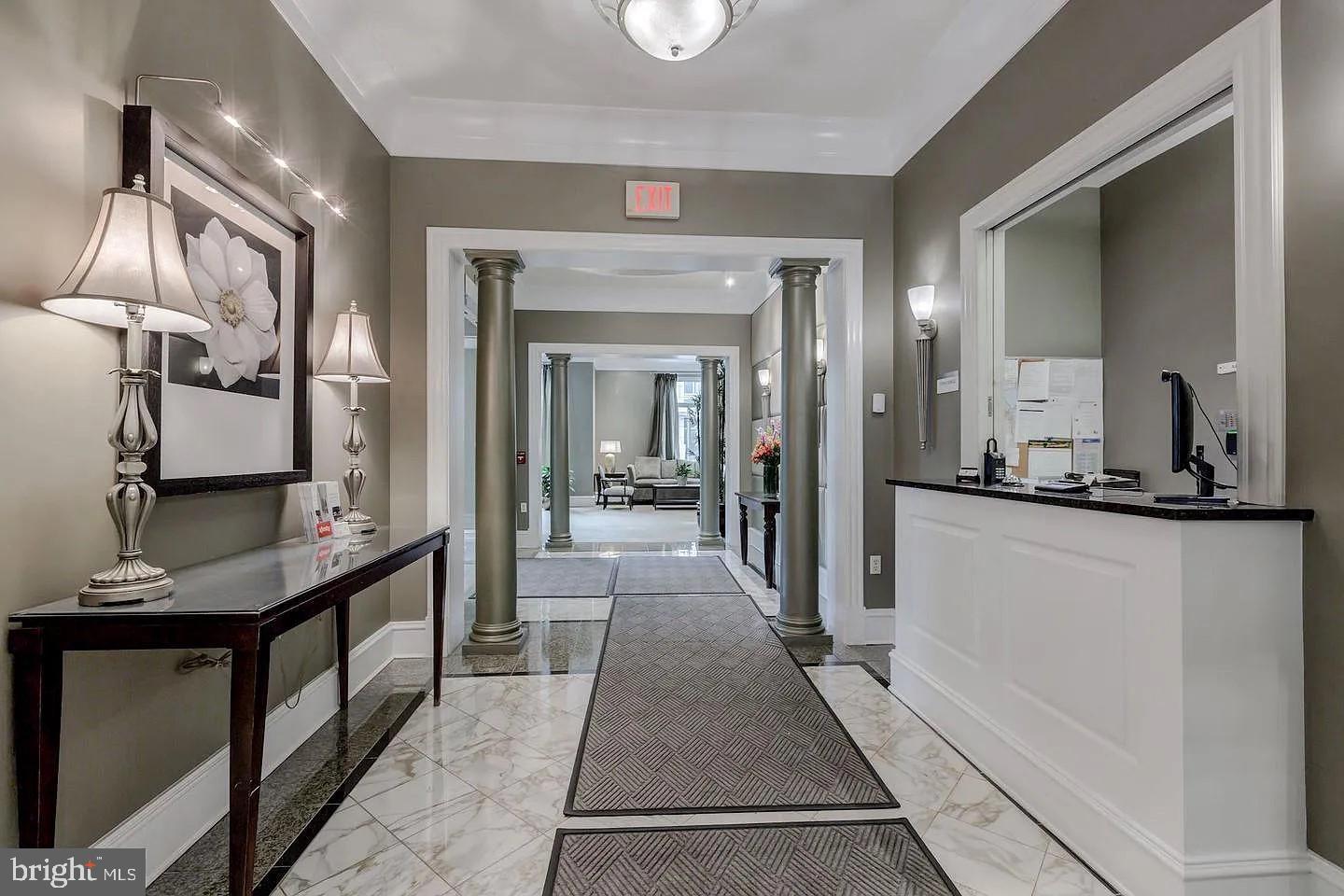 851 North Glebe Road, Unit 1818 Arlington, VA 22203 - Photo 13 of 23 a hallway with a view of living room and dining room