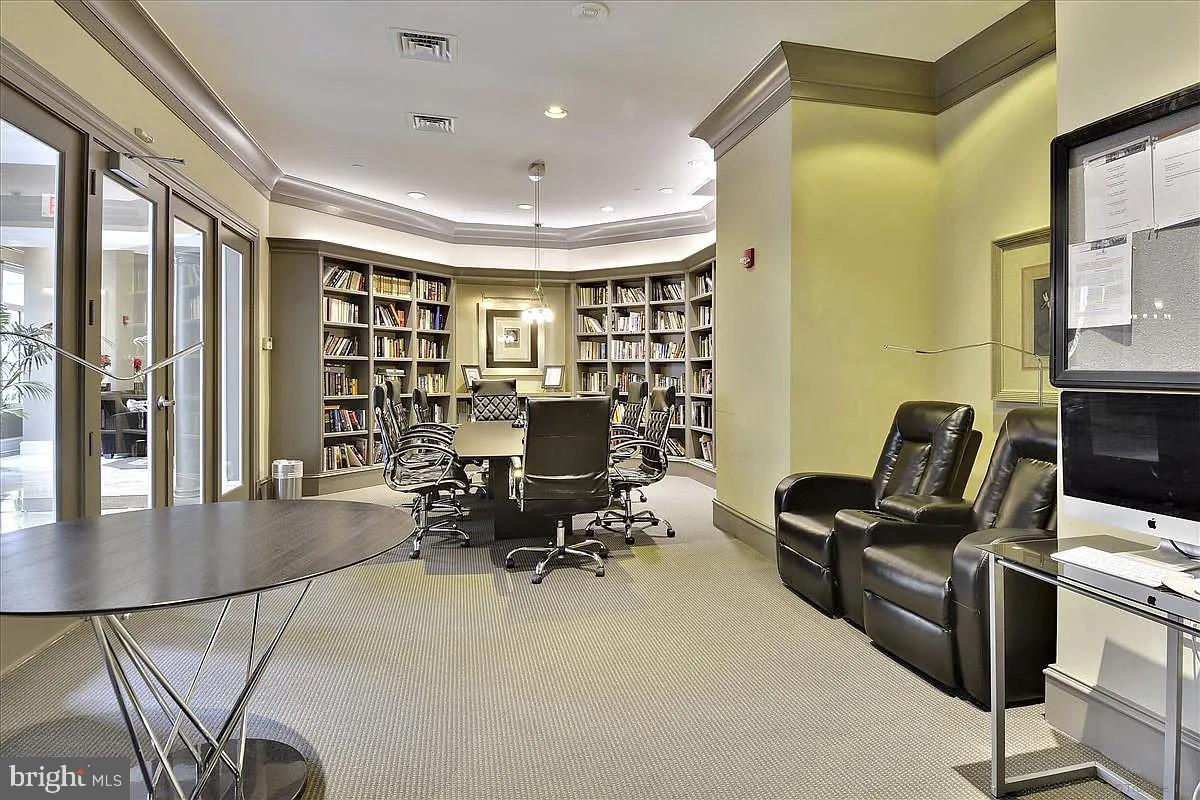 851 North Glebe Road, Unit 1818 Arlington, VA 22203 - Photo 14 of 23 a view of a livingroom with workspace and a window