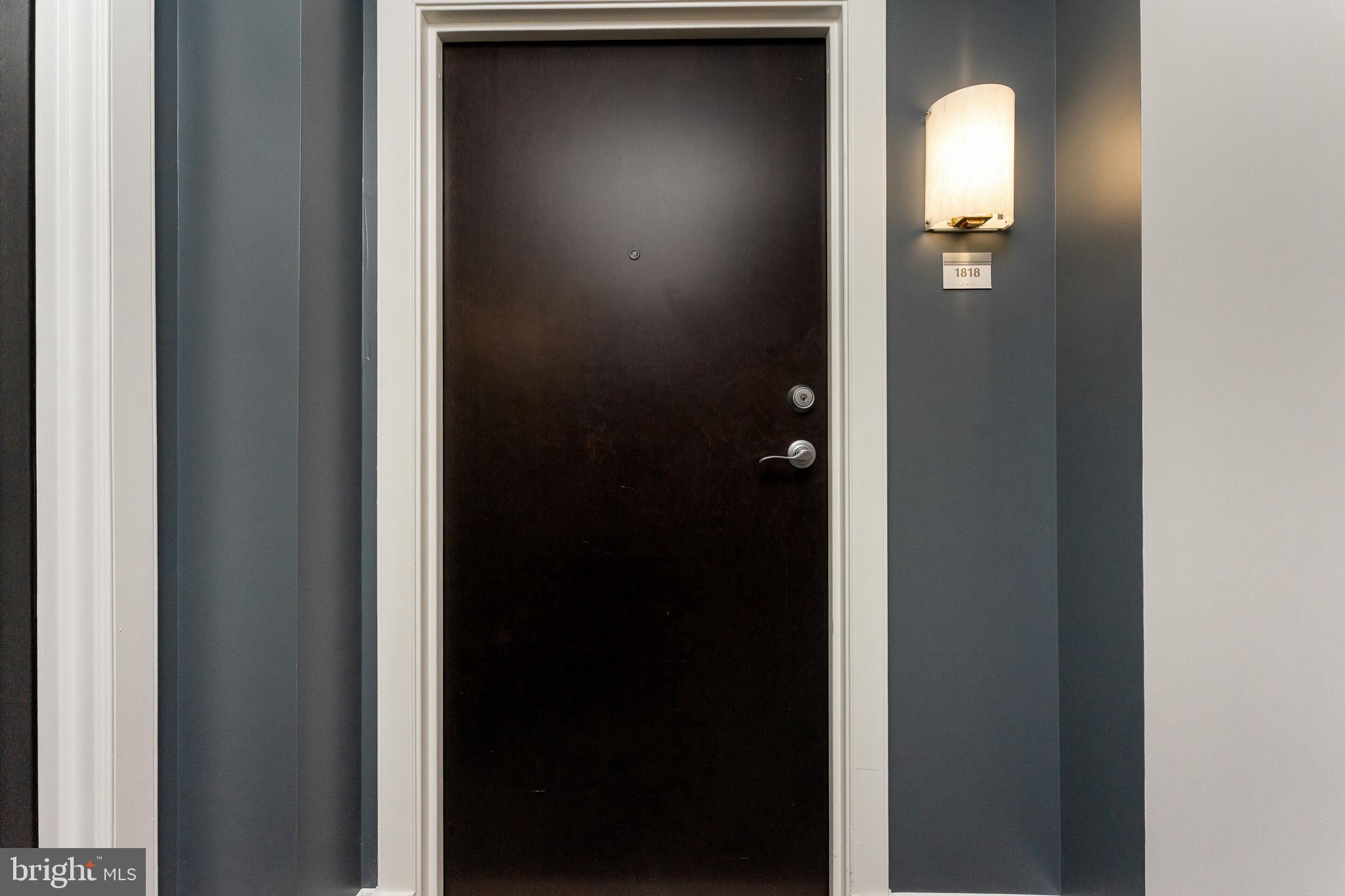 851 North Glebe Road, Unit 1818 Arlington, VA 22203 - Photo 2 of 23 a view of a bathroom from a hallway