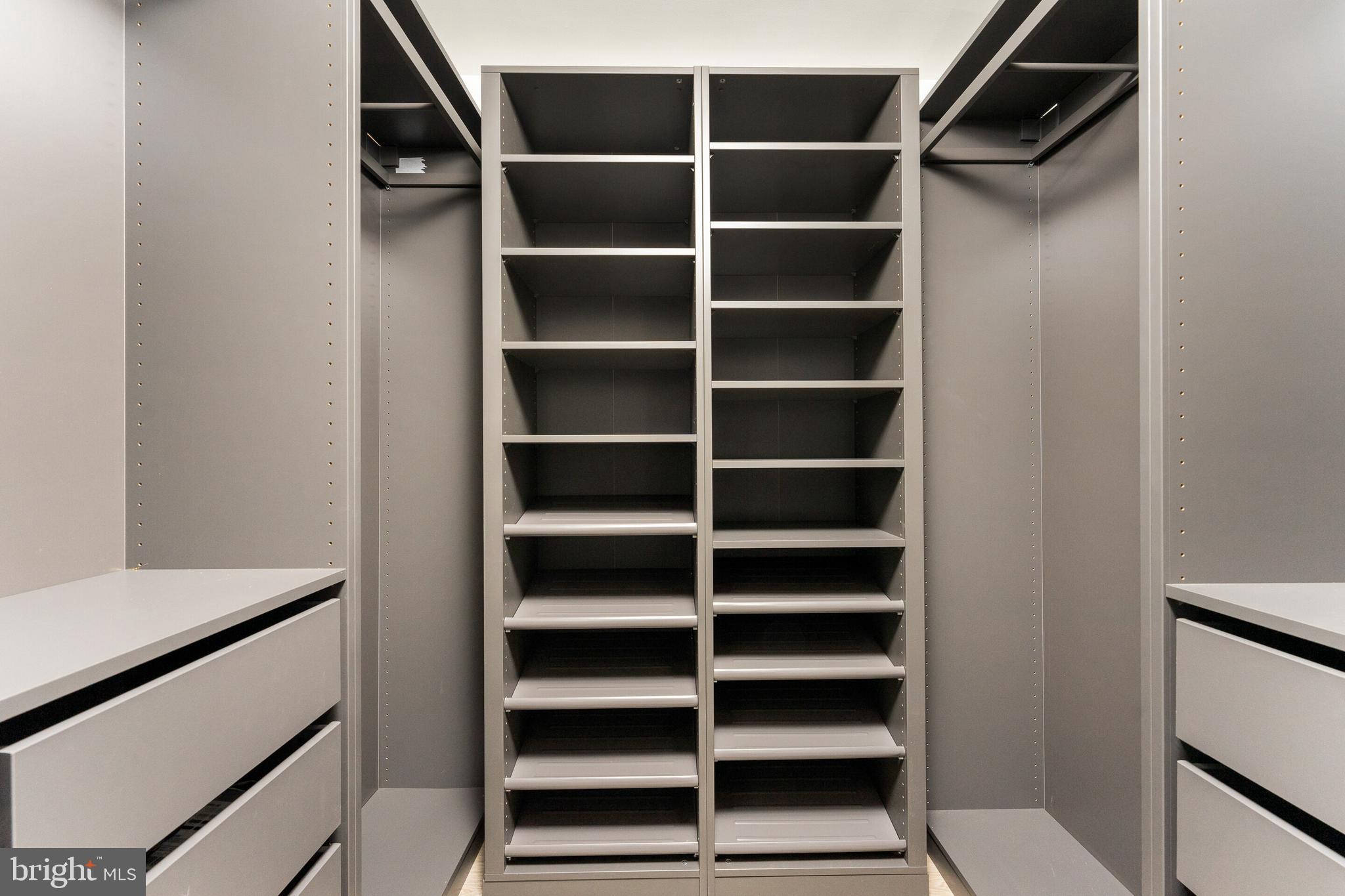 851 North Glebe Road, Unit 1818 Arlington, VA 22203 - Photo 10 of 23 a view of walk in closet with empty racks