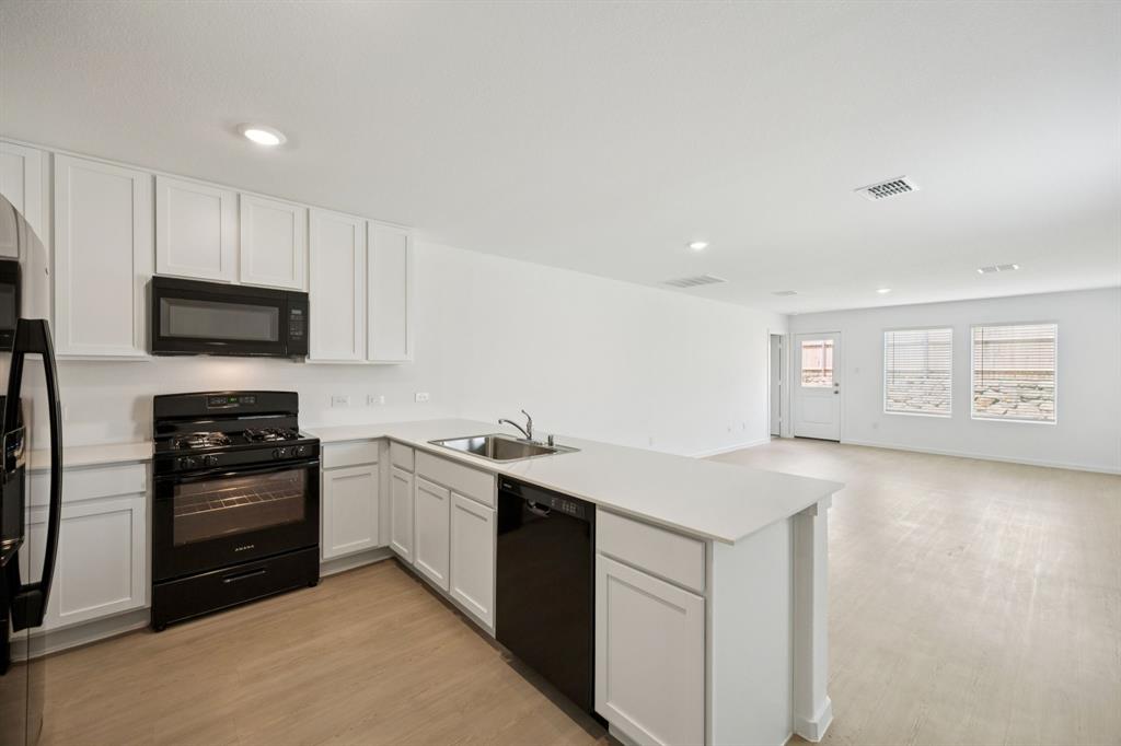11522 Gammon Avenue Rhome, TX 76078 - Photo 4 of 25 kitchen with all appliances included!