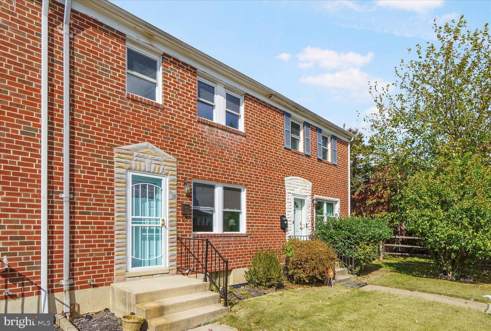 638 Charraway Road Baltimore, MD 21229 - Photo 3 of 37 a front view of a house with a yard