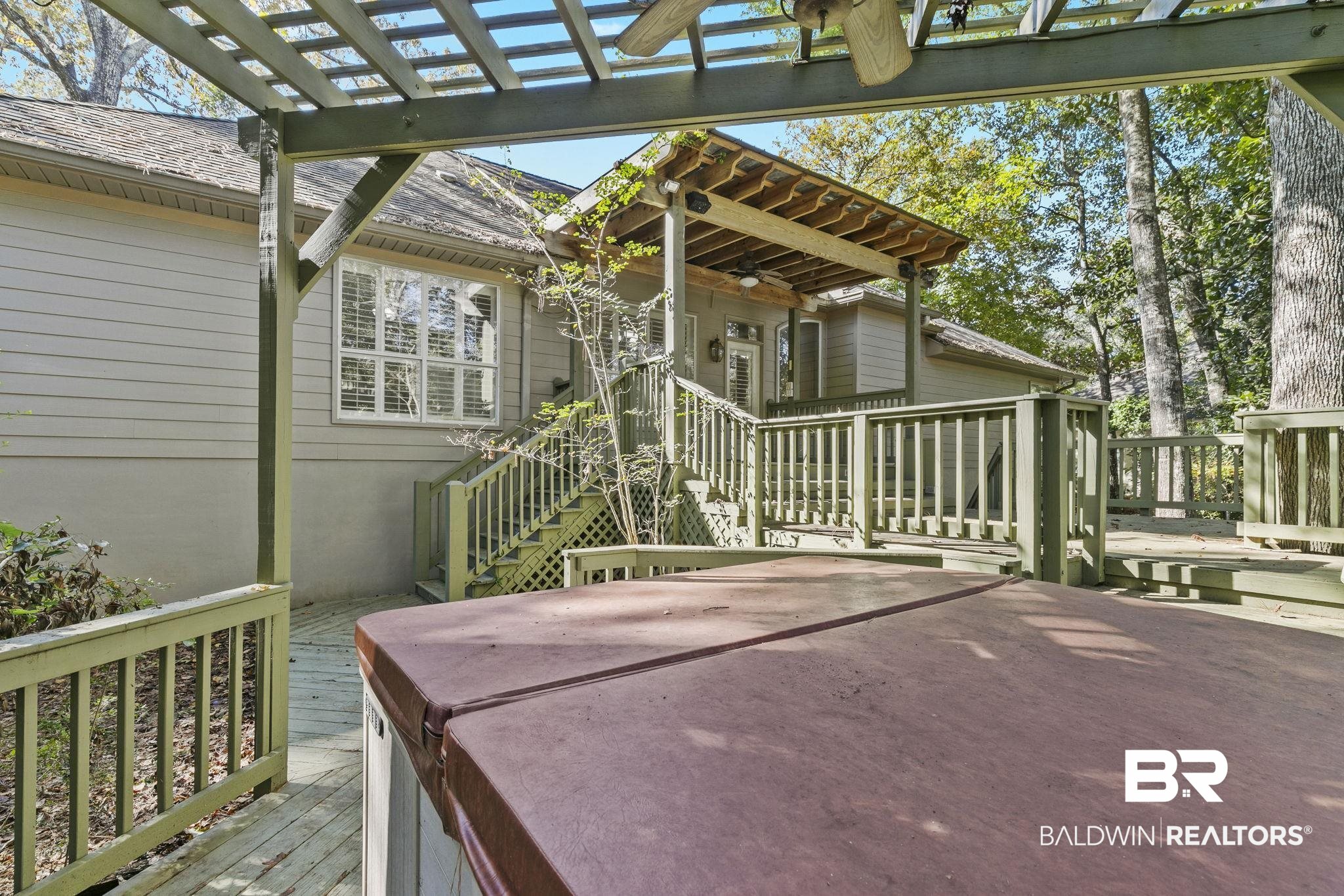 13 Bugle Retreat Daphne, AL 36527 - Photo 36 of 40 Wooden deck with a pergola, ceiling fan, and a hot tub