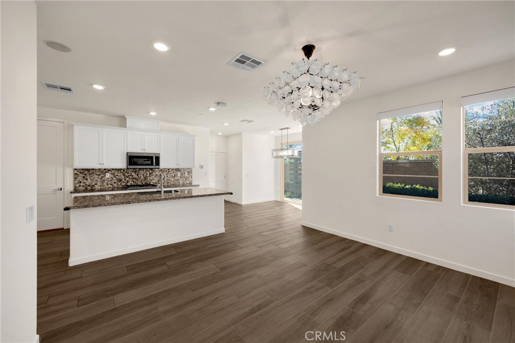 2323 Apple Upland, CA 91786 - Photo 15 of 57 a view of kitchen with refrigerator and window
