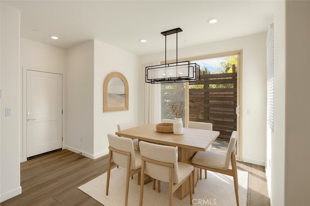 2323 Apple Upland, CA 91786 - Photo 2 of 57 a view of a dining room with furniture window and wooden floor