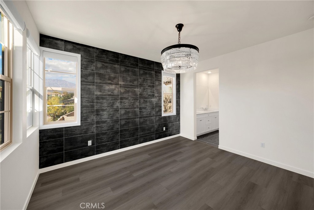 2323 Apple Upland, CA 91786 - Photo 25 of 57 a view of empty room with wooden floor and window