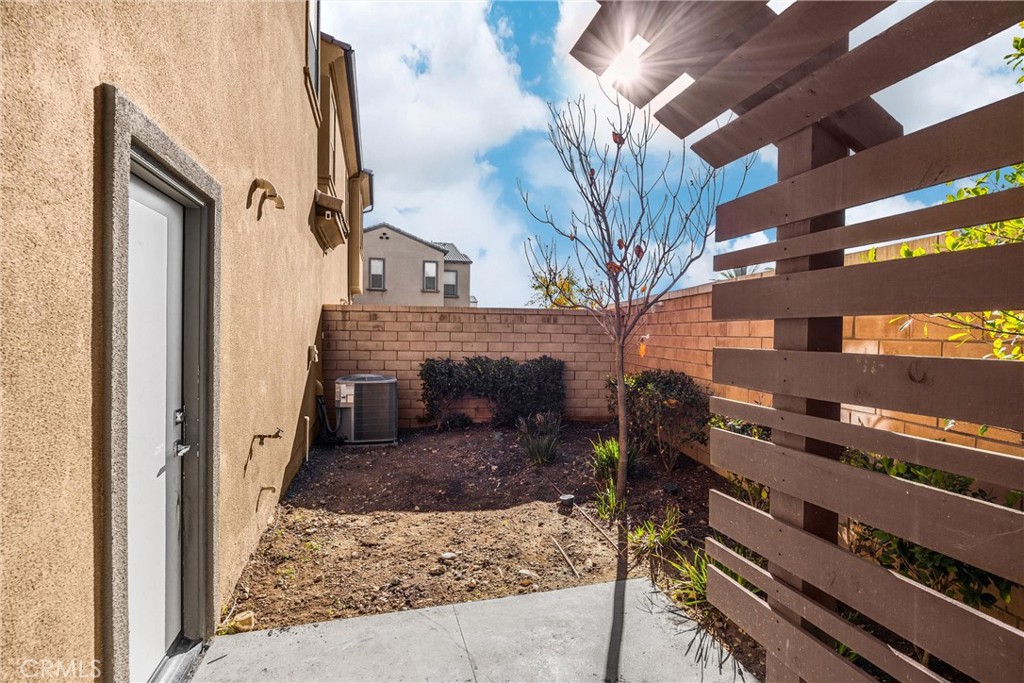 2323 Apple Upland, CA 91786 - Photo 38 of 57 a view of a fireplace and a table in a room