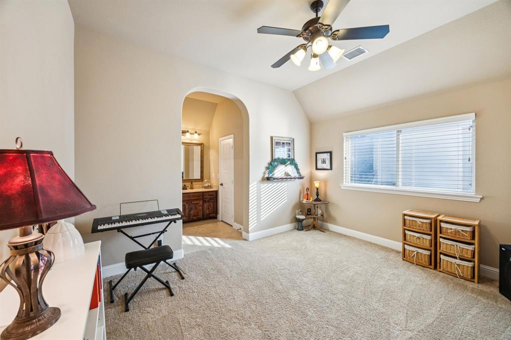 6579 Mountain Sky Road Frisco, TX 75036 - Photo 28 of 40 a view of a livingroom with furniture and a window