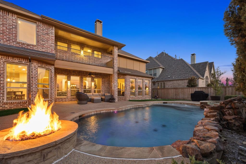 6579 Mountain Sky Road Frisco, TX 75036 - Photo 30 of 40 a view of a house with swimming pool and sitting area
