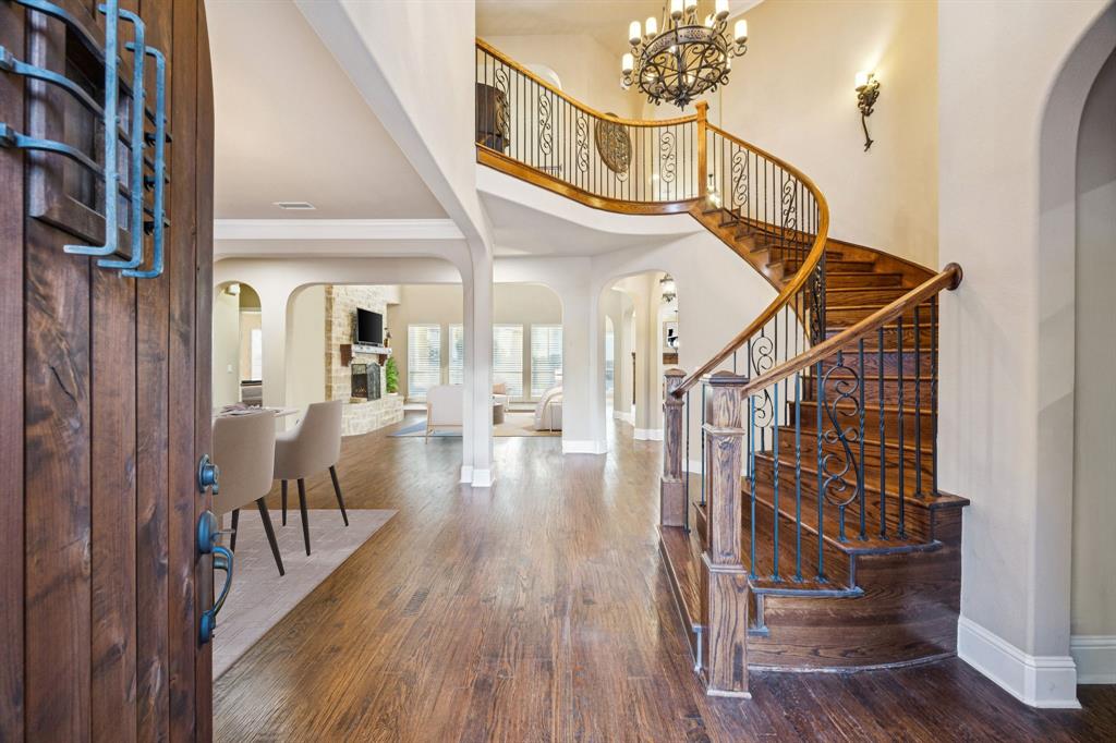 6579 Mountain Sky Road Frisco, TX 75036 - Photo 3 of 40 a view of entryway and hall with wooden floor