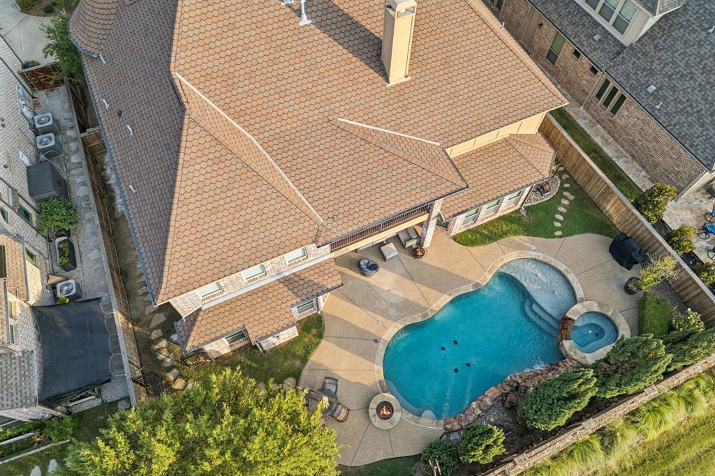 6579 Mountain Sky Road Frisco, TX 75036 - Photo 36 of 40 an aerial view of a house with a yard and potted plants