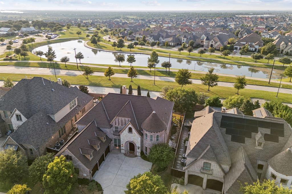 6579 Mountain Sky Road Frisco, TX 75036 - Photo 38 of 40 an aerial view of residential houses with outdoor space and ocean view