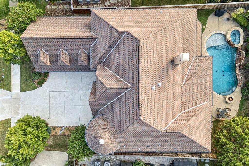 6579 Mountain Sky Road Frisco, TX 75036 - Photo 39 of 40 an aerial view of a house with a yard and a wooden fence
