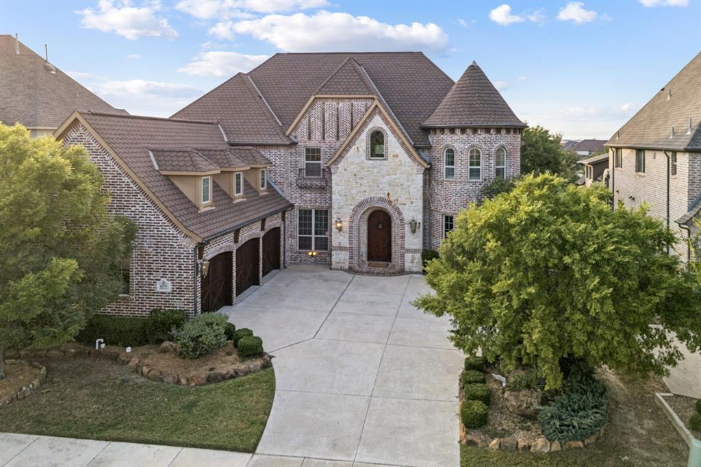 6579 Mountain Sky Road Frisco, TX 75036 - Photo 40 of 40 a view of a house with a small yard and large tree
