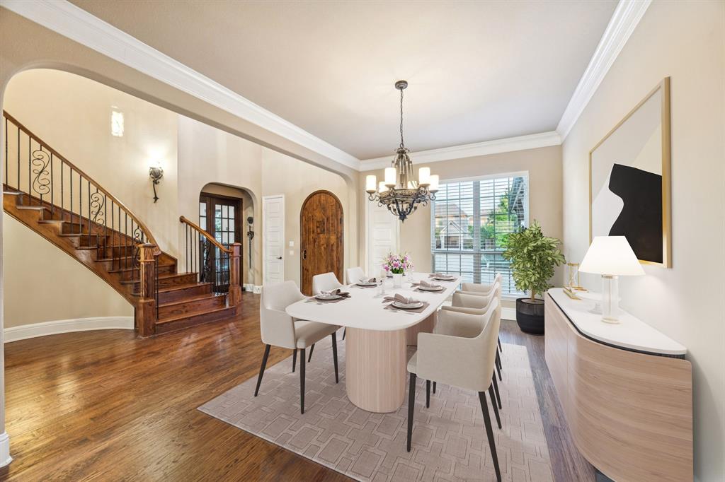 6579 Mountain Sky Road Frisco, TX 75036 - Photo 4 of 40 a view of a dining room with furniture window and wooden floor