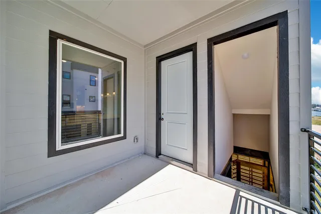 a view of a bedroom from a hallway