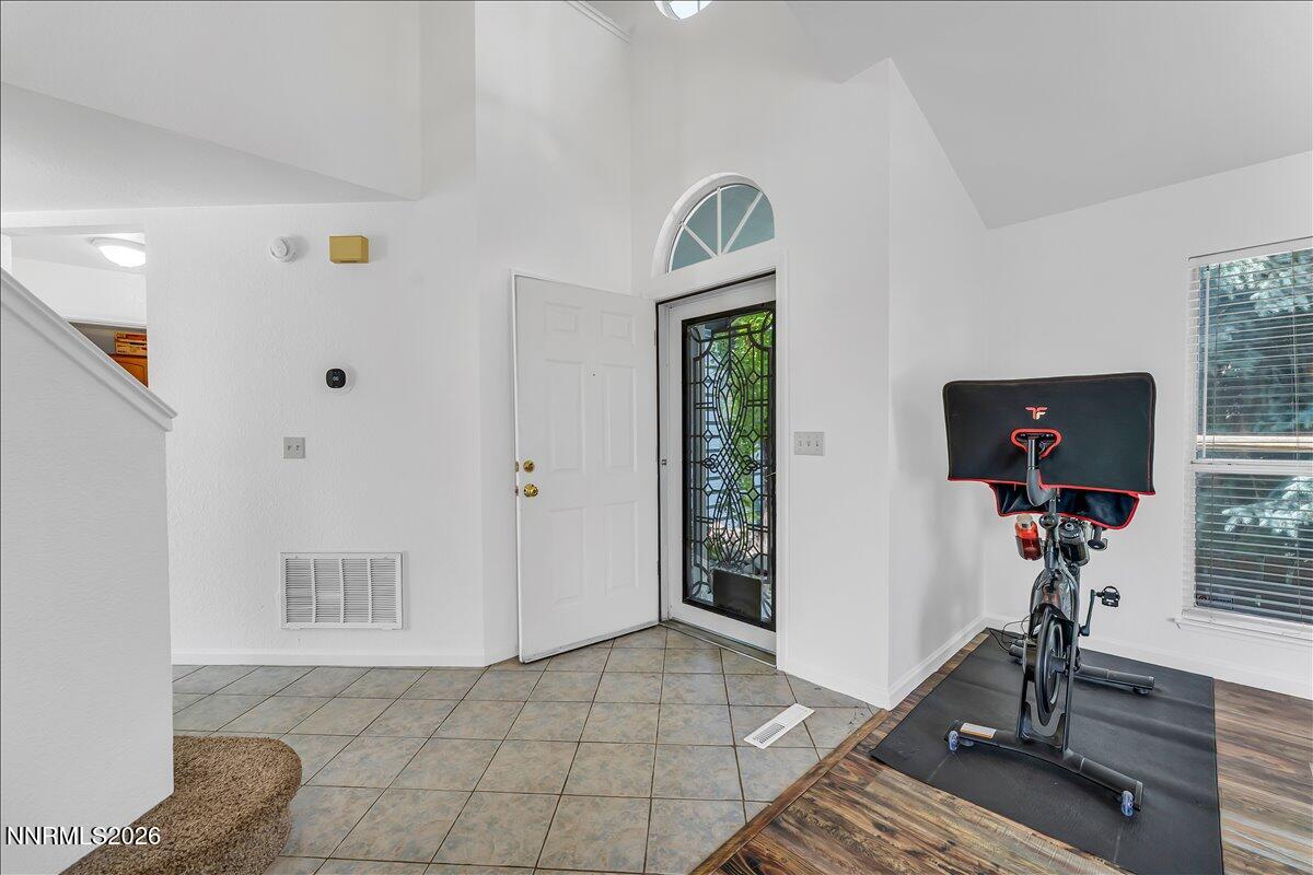 10 Eagle Claw Court Reno, NV 89523 - Photo 6 of 36 a living room with furniture and a flat screen tv