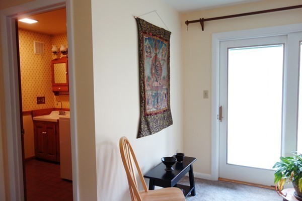 55 High Point Drive Amherst, MA 01002 - Photo 19 of 30 a view of a hallway and a livingroom with a window