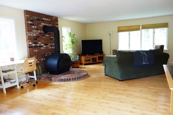 55 High Point Drive Amherst, MA 01002 - Photo 2 of 30 a living room with furniture window and a flat screen tv