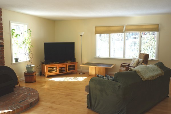 55 High Point Drive Amherst, MA 01002 - Photo 3 of 30 a living room with furniture and a flat screen tv
