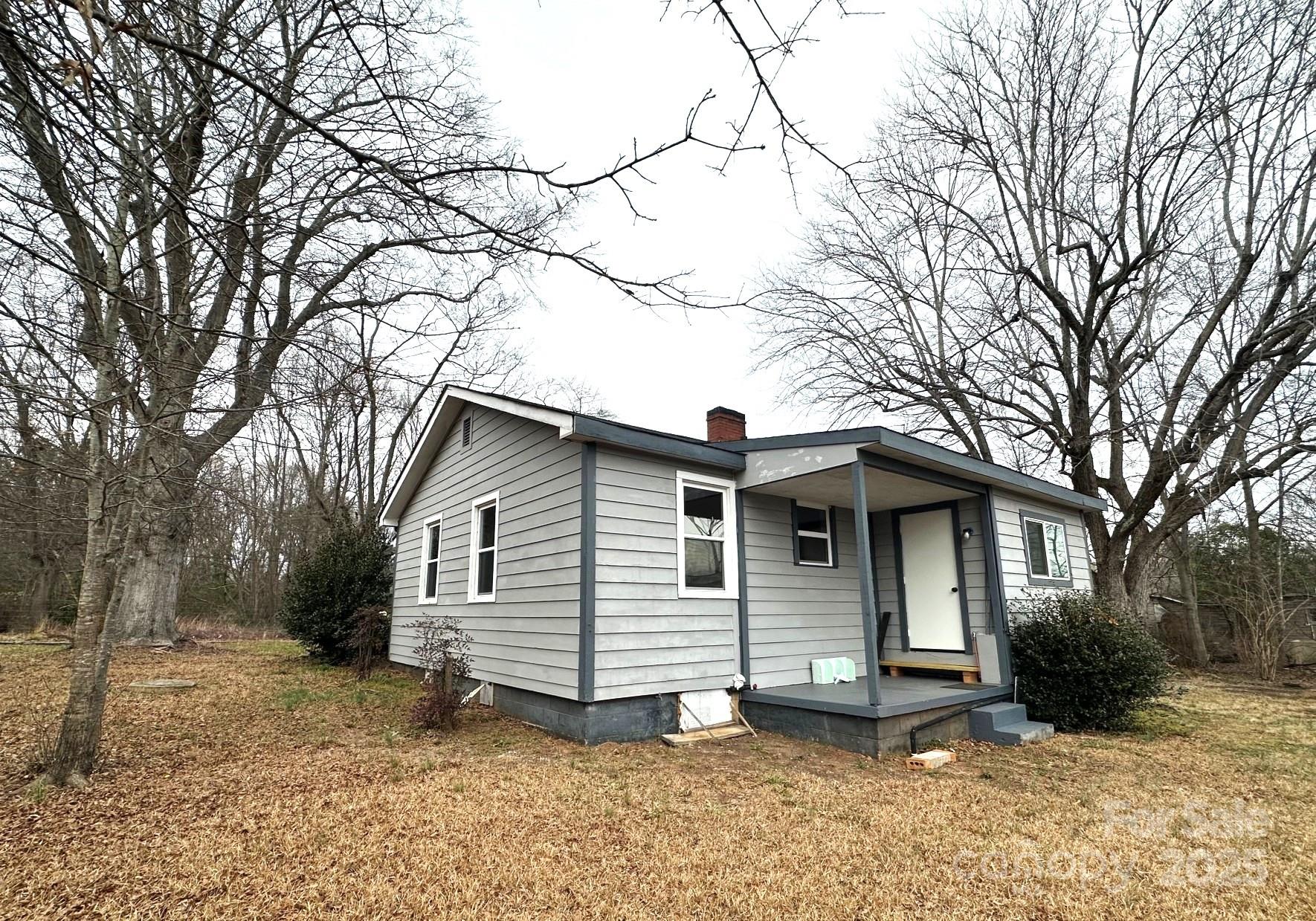 170 Proctor School Road Mooresboro, NC 28114 - Photo 25 of 32 a view of a house with a yard
