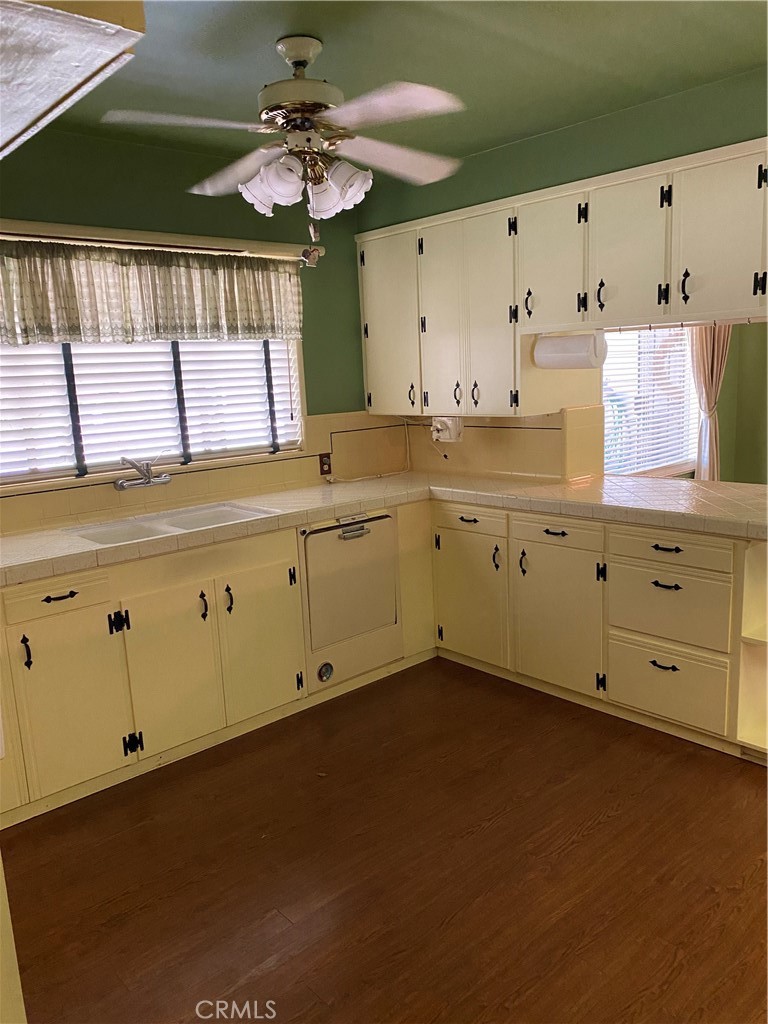 2805 Forist Lane Merced, CA 95340 - Photo 4 of 26 a kitchen with cabinets a sink and dishwasher