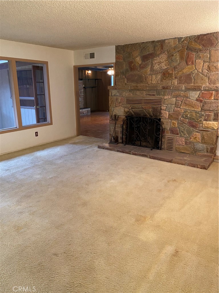 2805 Forist Lane Merced, CA 95340 - Photo 5 of 26 an empty room with a fireplace