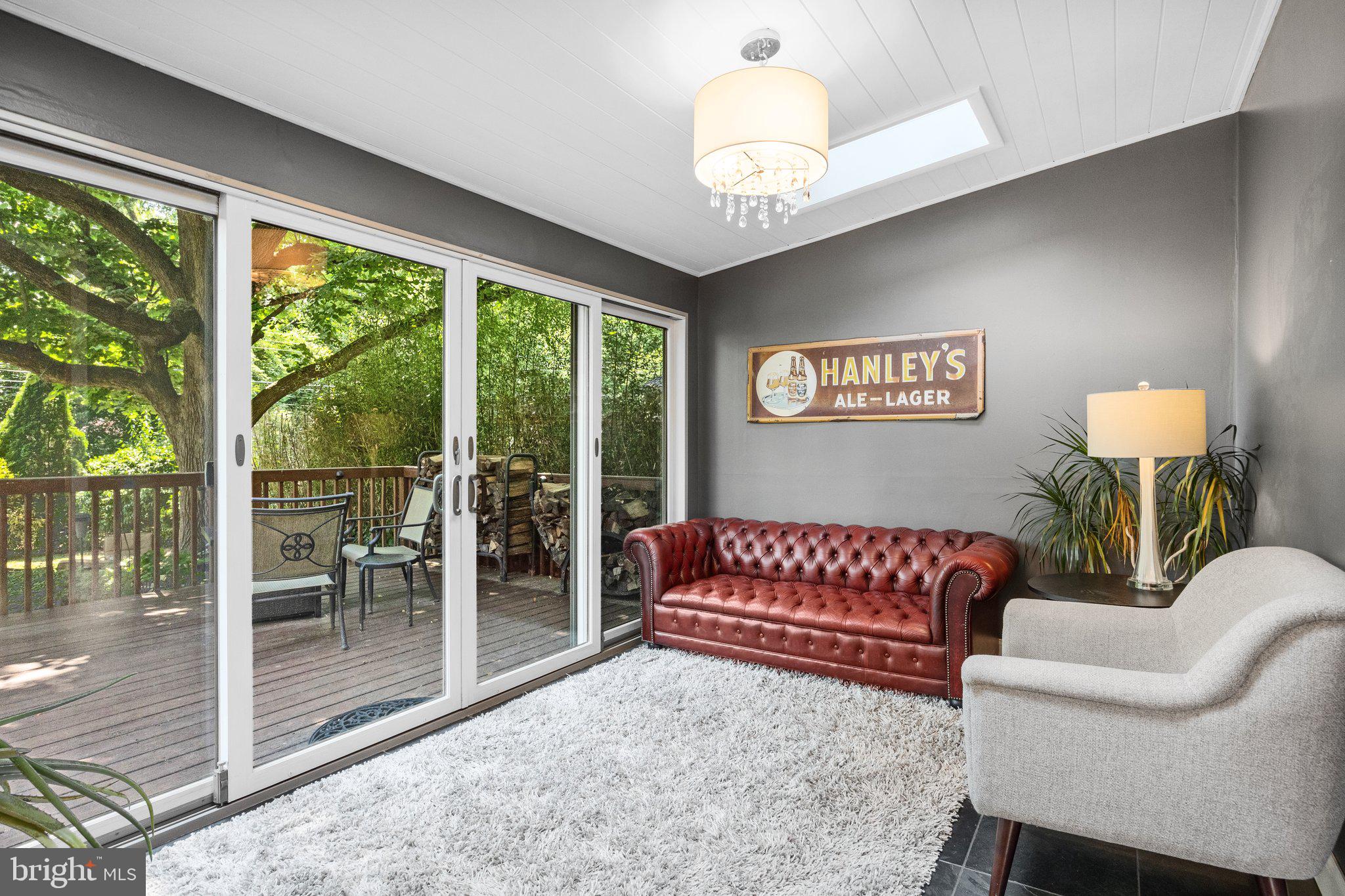 1313 Moon Drive Yardley, PA 19067 - Photo 13 of 56 a view of a room with furniture wooden floor and chandelier