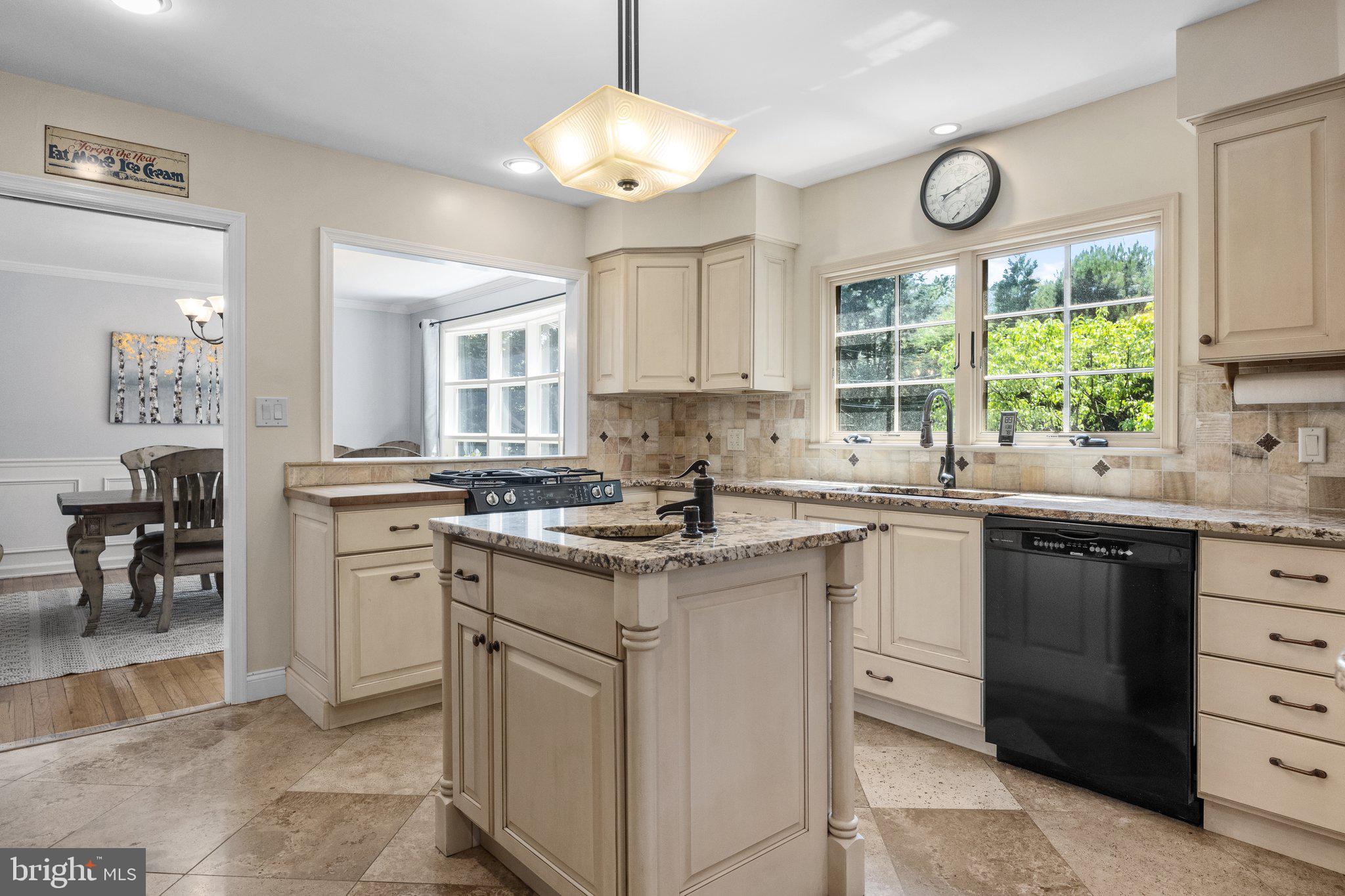 1313 Moon Drive Yardley, PA 19067 - Photo 14 of 56 a kitchen with a sink stove and cabinets