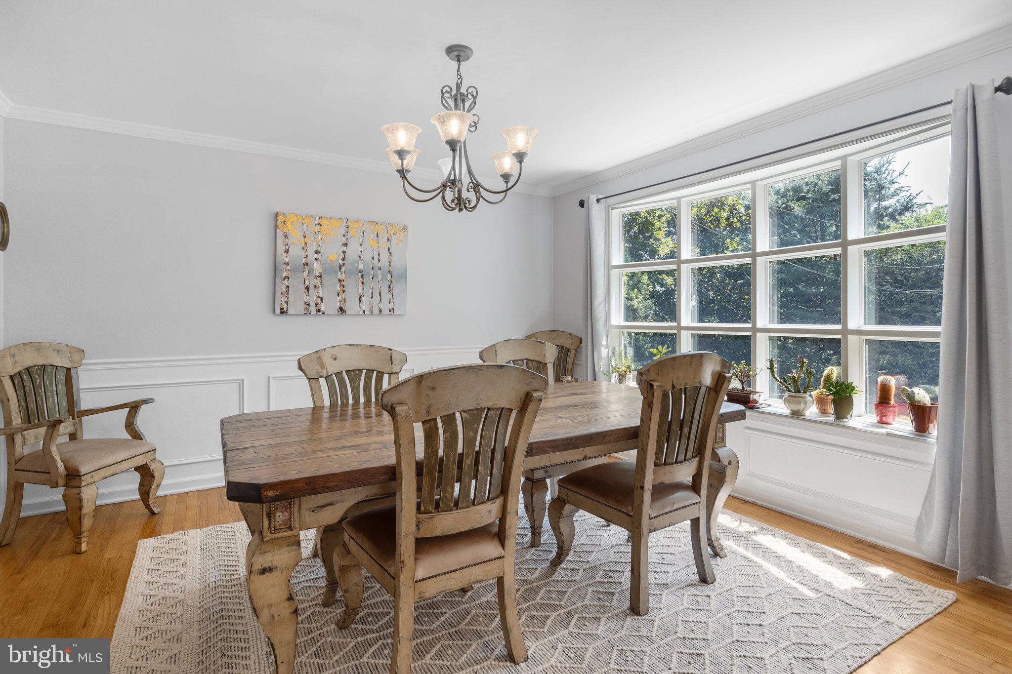 1313 Moon Drive Yardley, PA 19067 - Photo 21 of 56 a view of a dining room with furniture a rug and wooden floor
