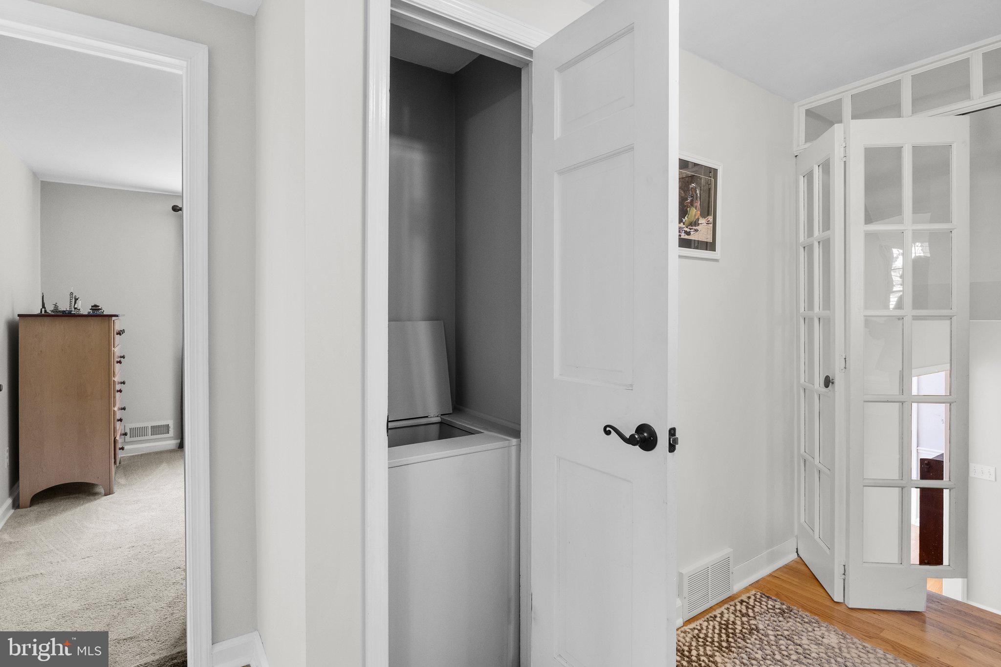 1313 Moon Drive Yardley, PA 19067 - Photo 25 of 56 a walk in closet with wooden floor