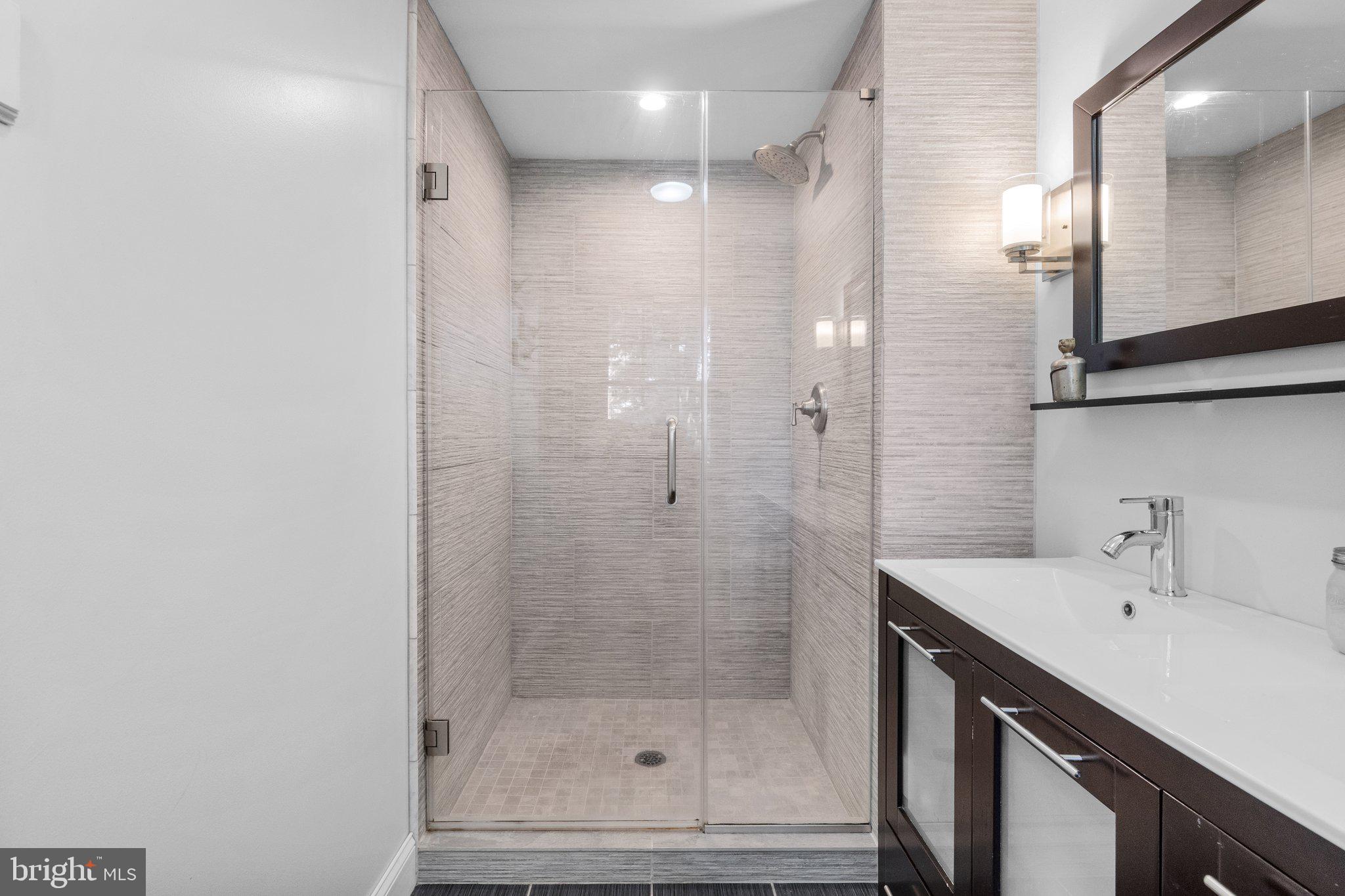 1313 Moon Drive Yardley, PA 19067 - Photo 29 of 56 a bathroom with a shower and sink