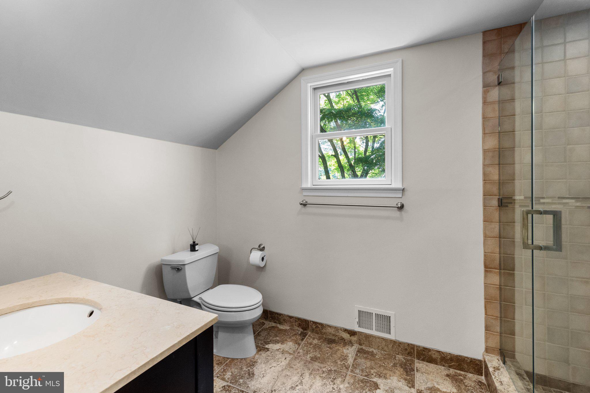 1313 Moon Drive Yardley, PA 19067 - Photo 35 of 56 a bathroom with a sink a toilet and a shower