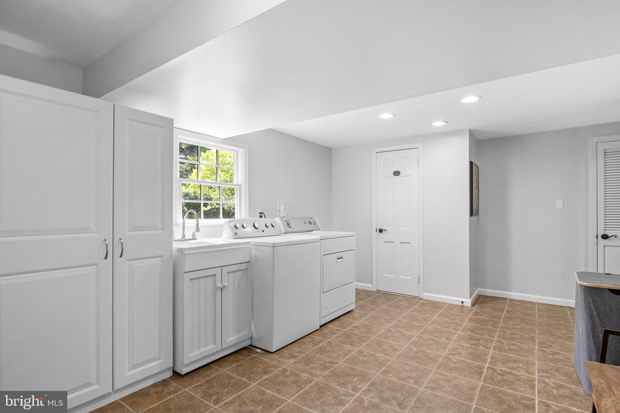 1313 Moon Drive Yardley, PA 19067 - Photo 39 of 56 a bathroom with a sink a mirror and a bathtub