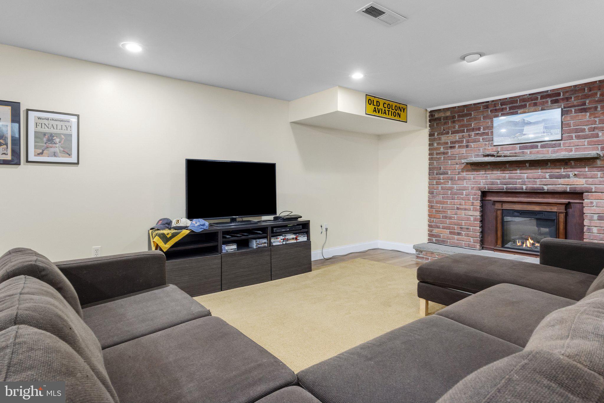 1313 Moon Drive Yardley, PA 19067 - Photo 44 of 56 a living room with furniture and a flat screen tv