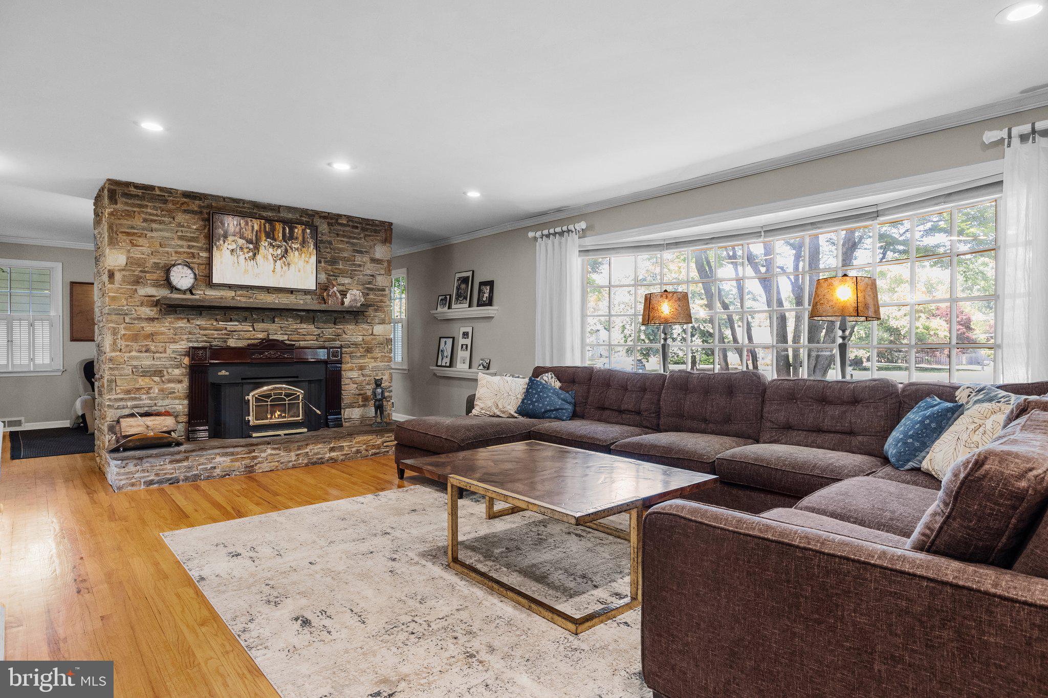 1313 Moon Drive Yardley, PA 19067 - Photo 7 of 56 a living room with furniture and a fireplace