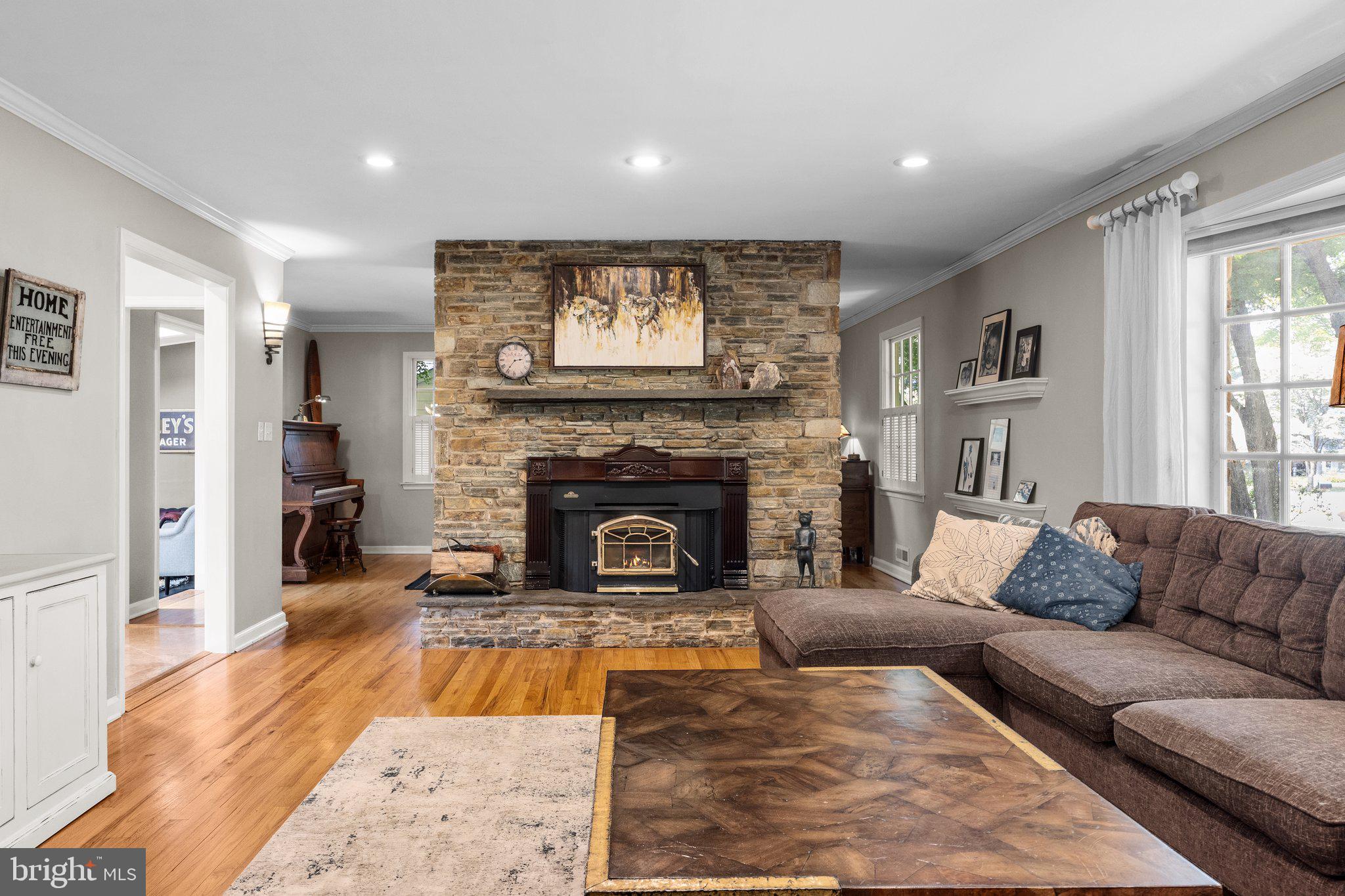 1313 Moon Drive Yardley, PA 19067 - Photo 9 of 56 a living room with furniture and a fireplace