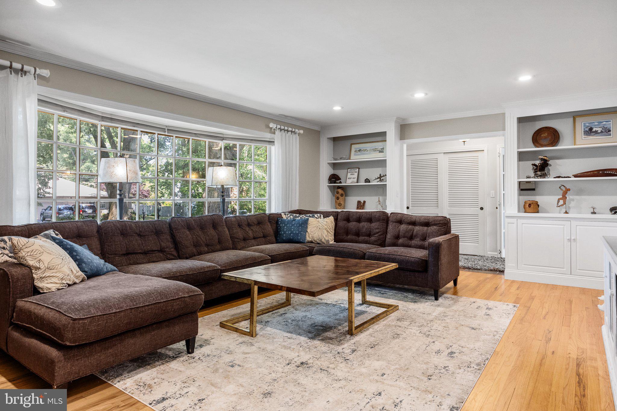 1313 Moon Drive Yardley, PA 19067 - Photo 10 of 56 a living room with furniture and a wooden floor