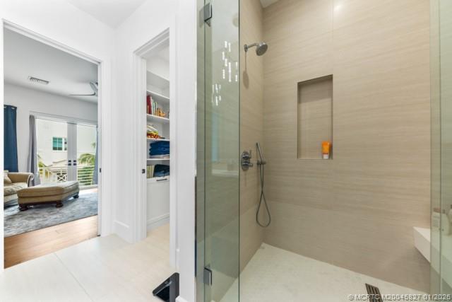 53 Southeast Seminole Street, Unit 2B Stuart, FL 34994 - Photo 21 of 31 a bathroom with a shower
