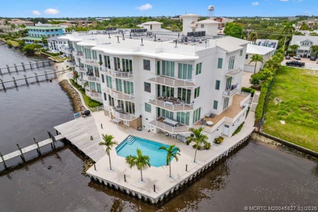 53 Southeast Seminole Street, Unit 2B Stuart, FL 34994 - Photo 7 of 31 an aerial view of an buildings and city view