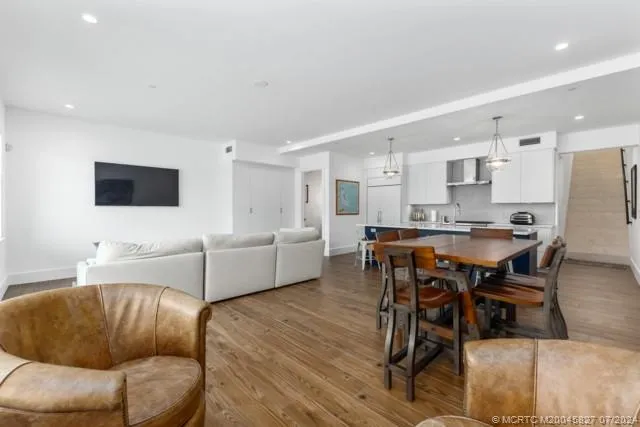 a living room with a couch and a window