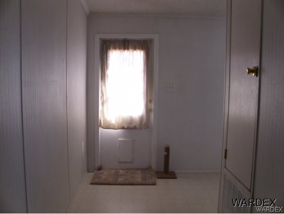 4390 North Shadow Road Kingman, AZ 86409 - Photo 35 of 36 hall to back door