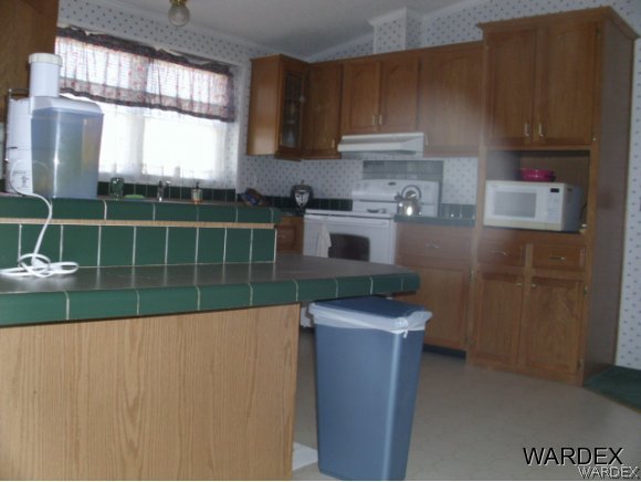 4390 North Shadow Road Kingman, AZ 86409 - Photo 36 of 36 kitchen w island